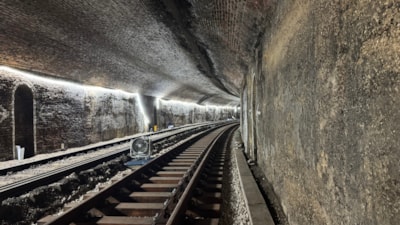 Rail engineers installing new track panels on a railway line