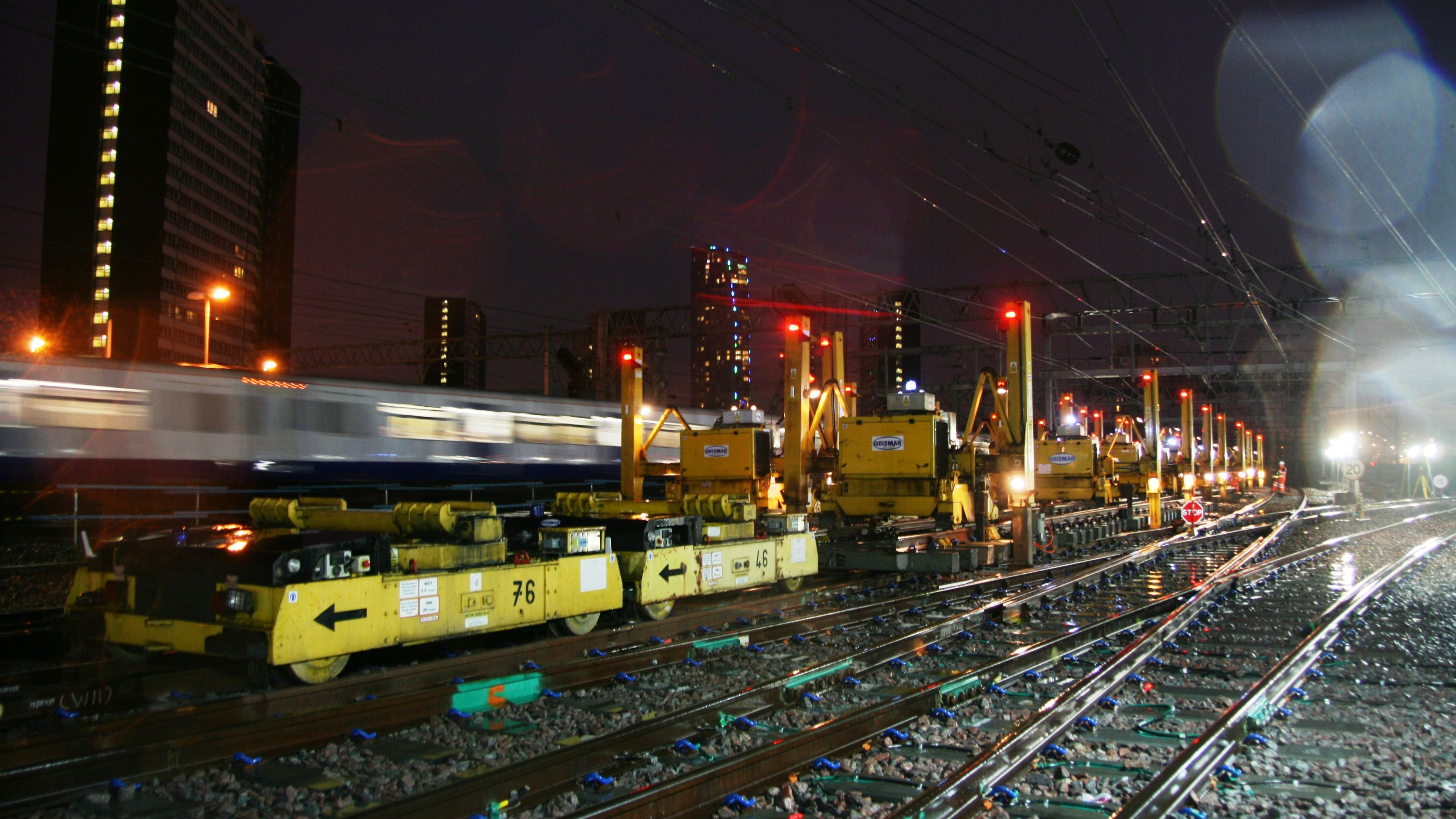 Rail engineers renewing a set of points and ballast on a closed railway line