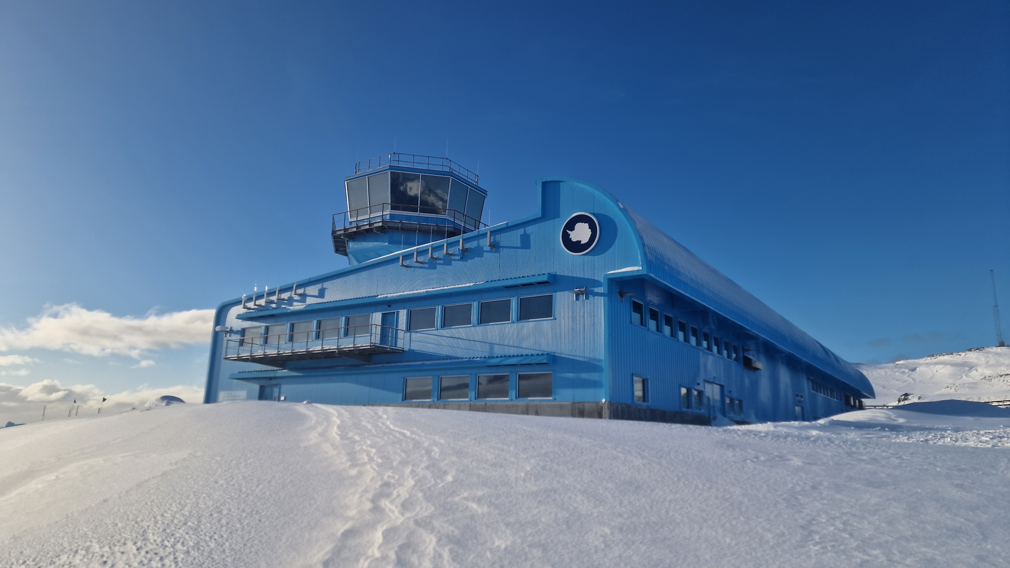 A research station building on snow-covered ground in Antarctica