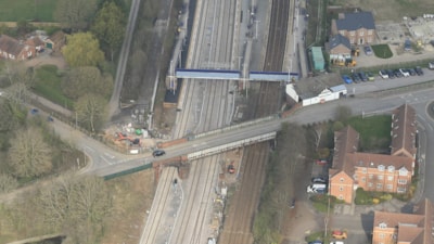 Engineers lifting a bridge deck over a railway line during a possession